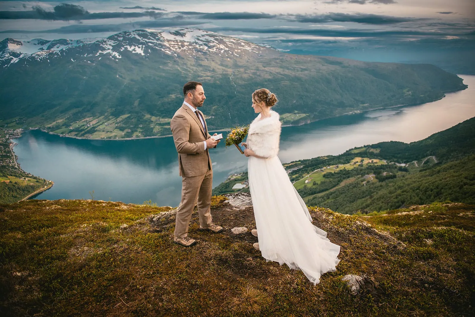 Stunning moment as they enjoying their fjords elopement ceremony