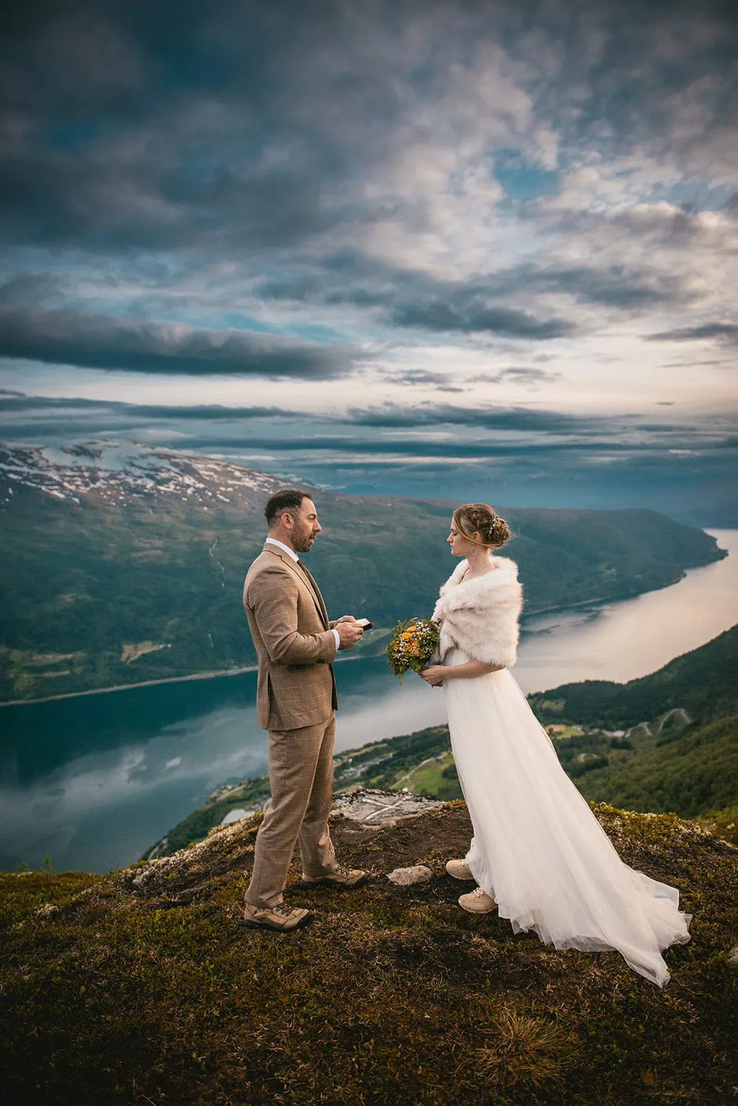 A stunning ceremony on a mountain top during a fjords elopement in Norway
