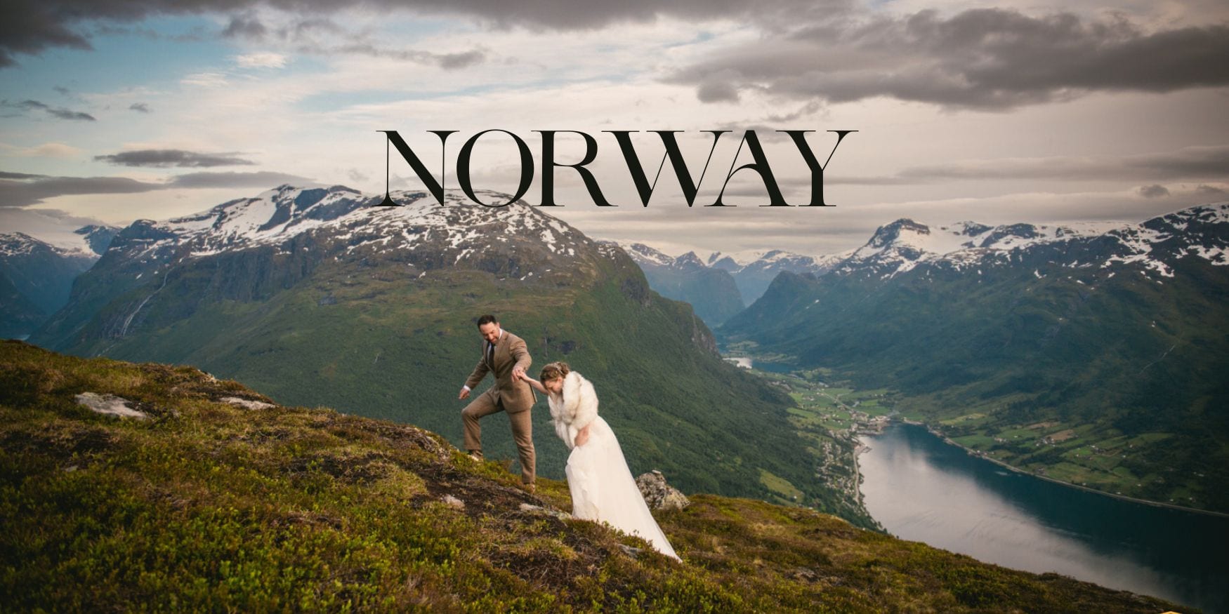 Beautiful Norway mountain landscape with a bride and groom during an elopement ceremony.