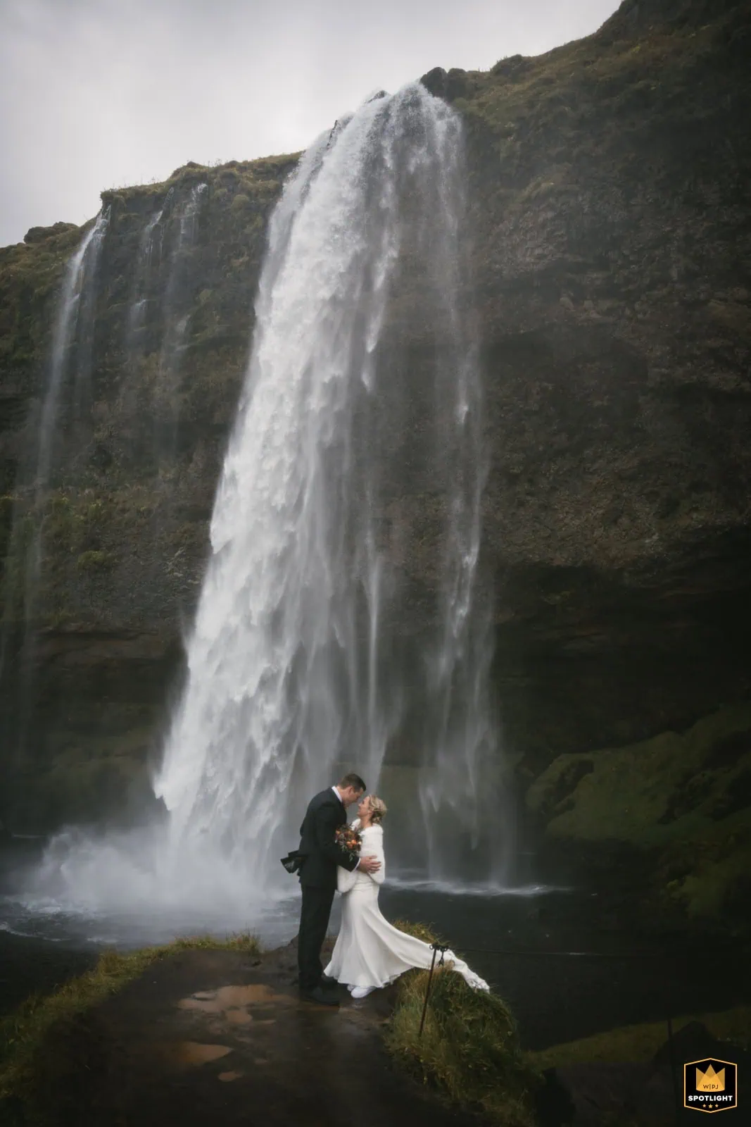 Couple exploring a dramatic landscape during their multi-day destination elopement