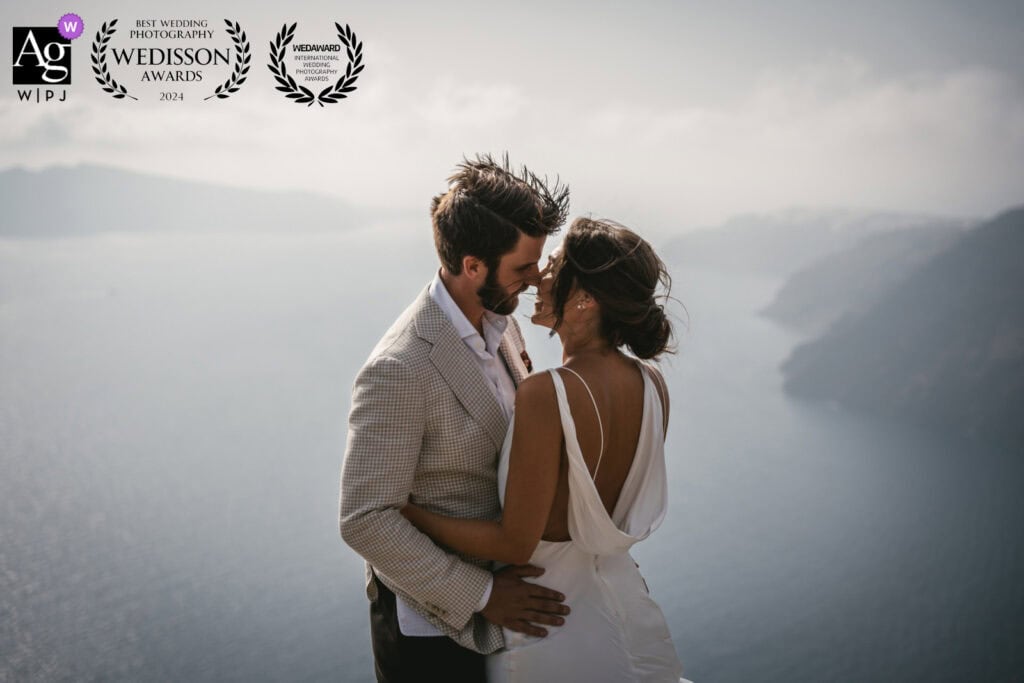 Elopement couple overlooking Italian lake with mountains, romantic wedding scene.