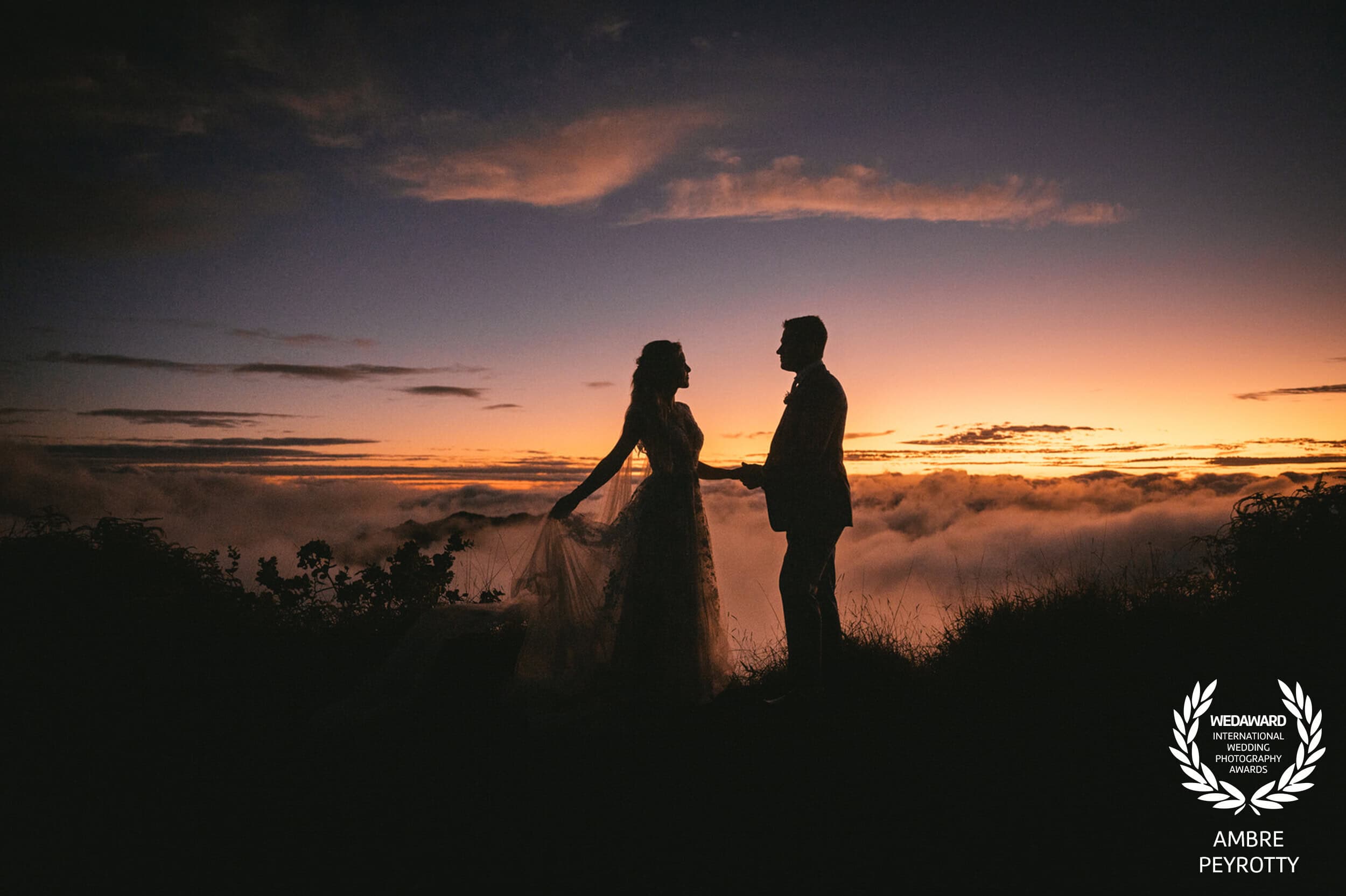 Couple under clear blue skies during Fiji dry season elopement