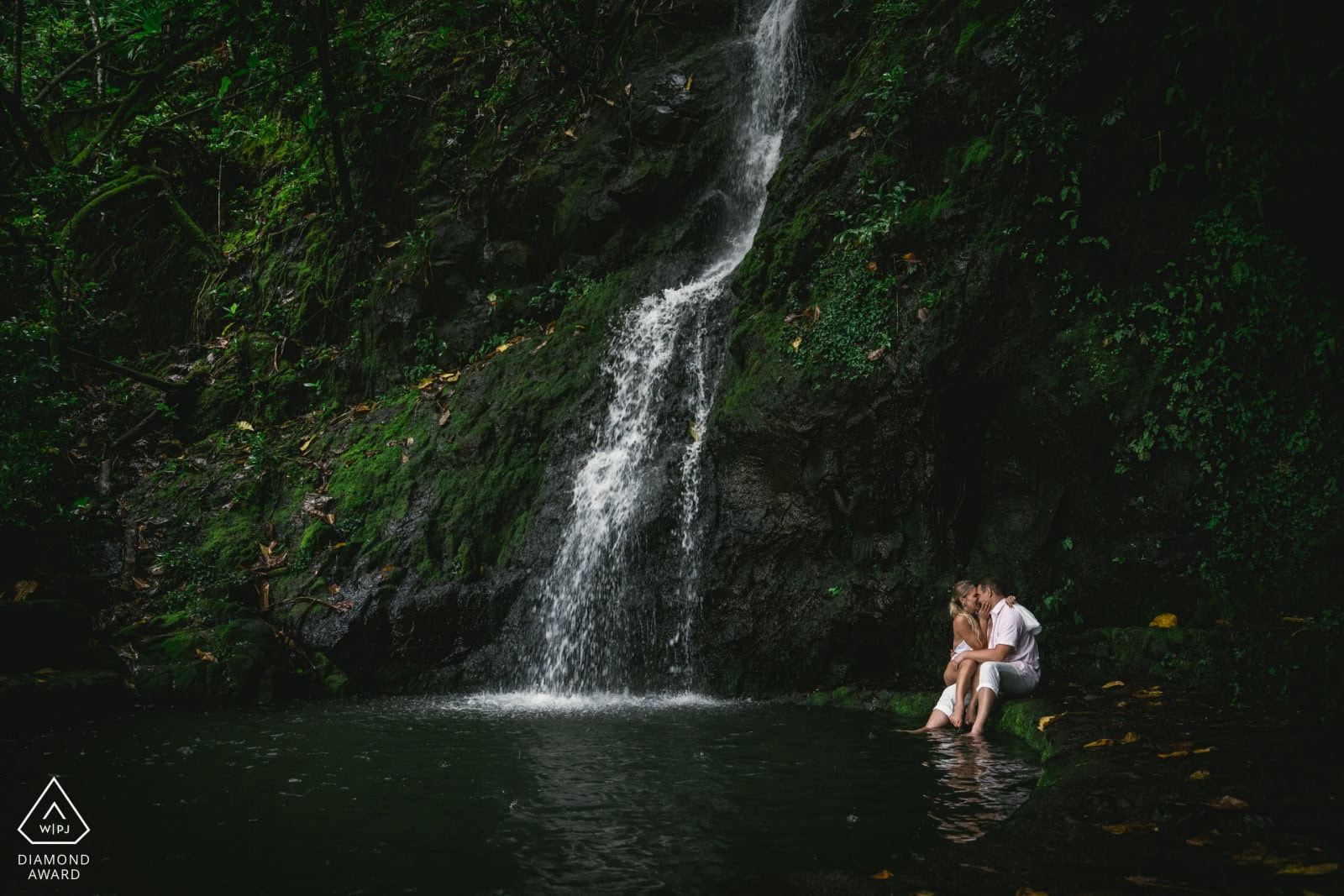 Full waterfalls and lush jungle during Fiji green season